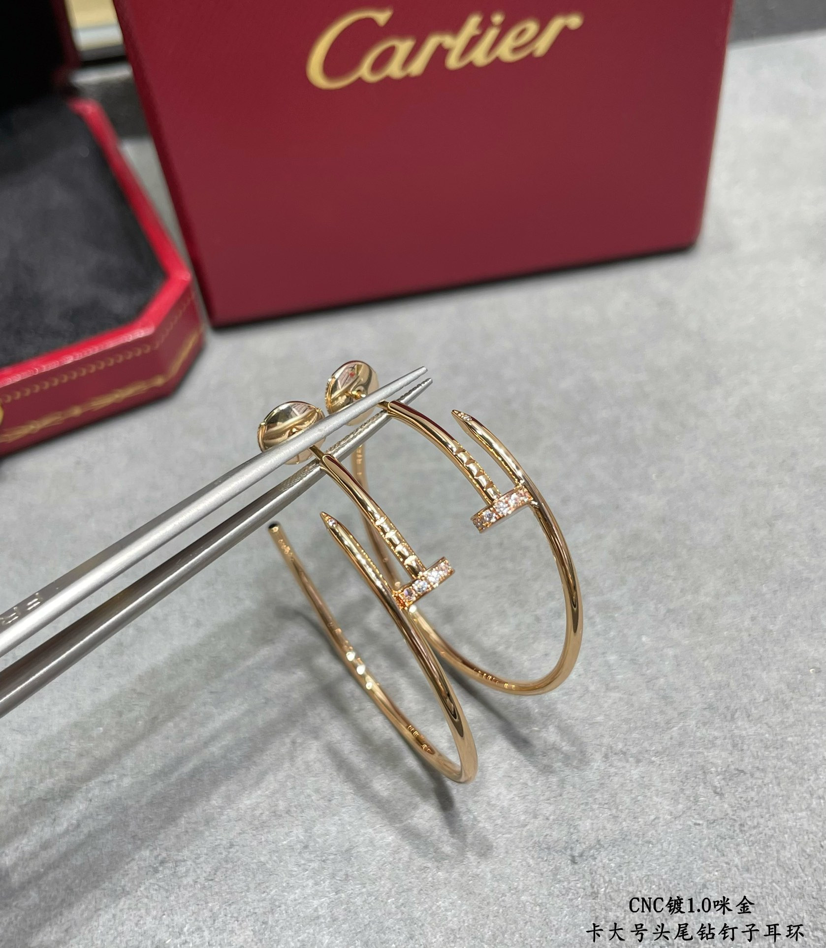 ca*t*er large size head and tail Di*m*nd nail earrings