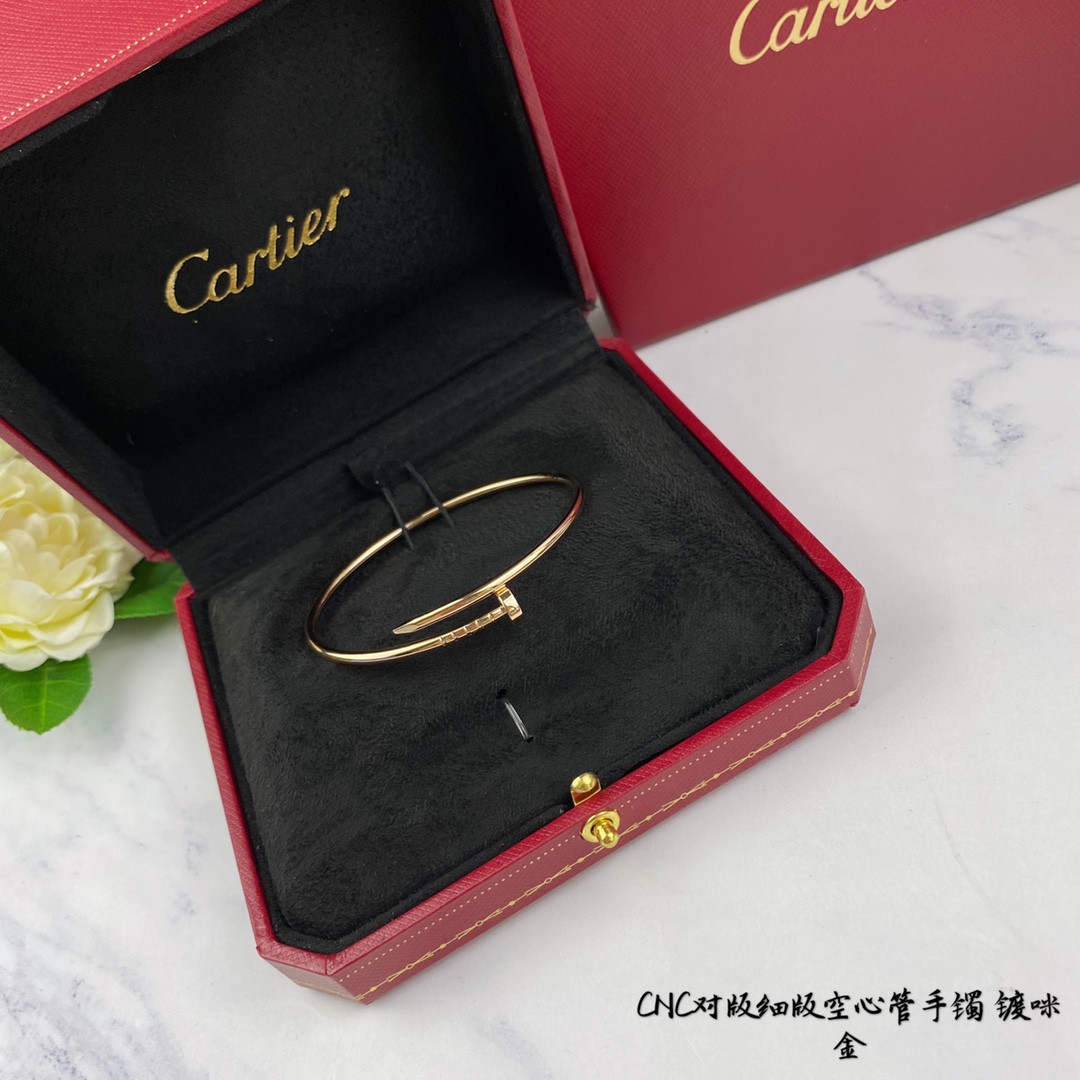Ca*t*er thin hollow tube polished nail bracelet
