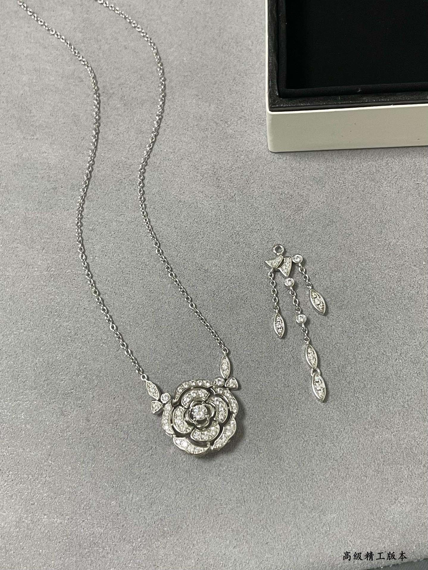 Ch*el camellia tassel necklace