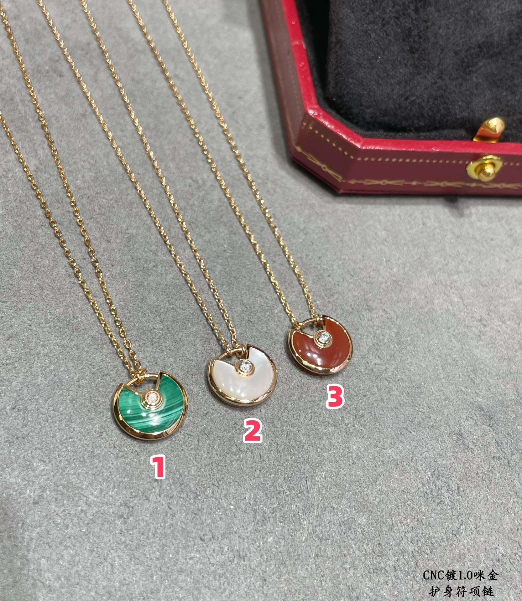 Ca*t*er amulet necklace
