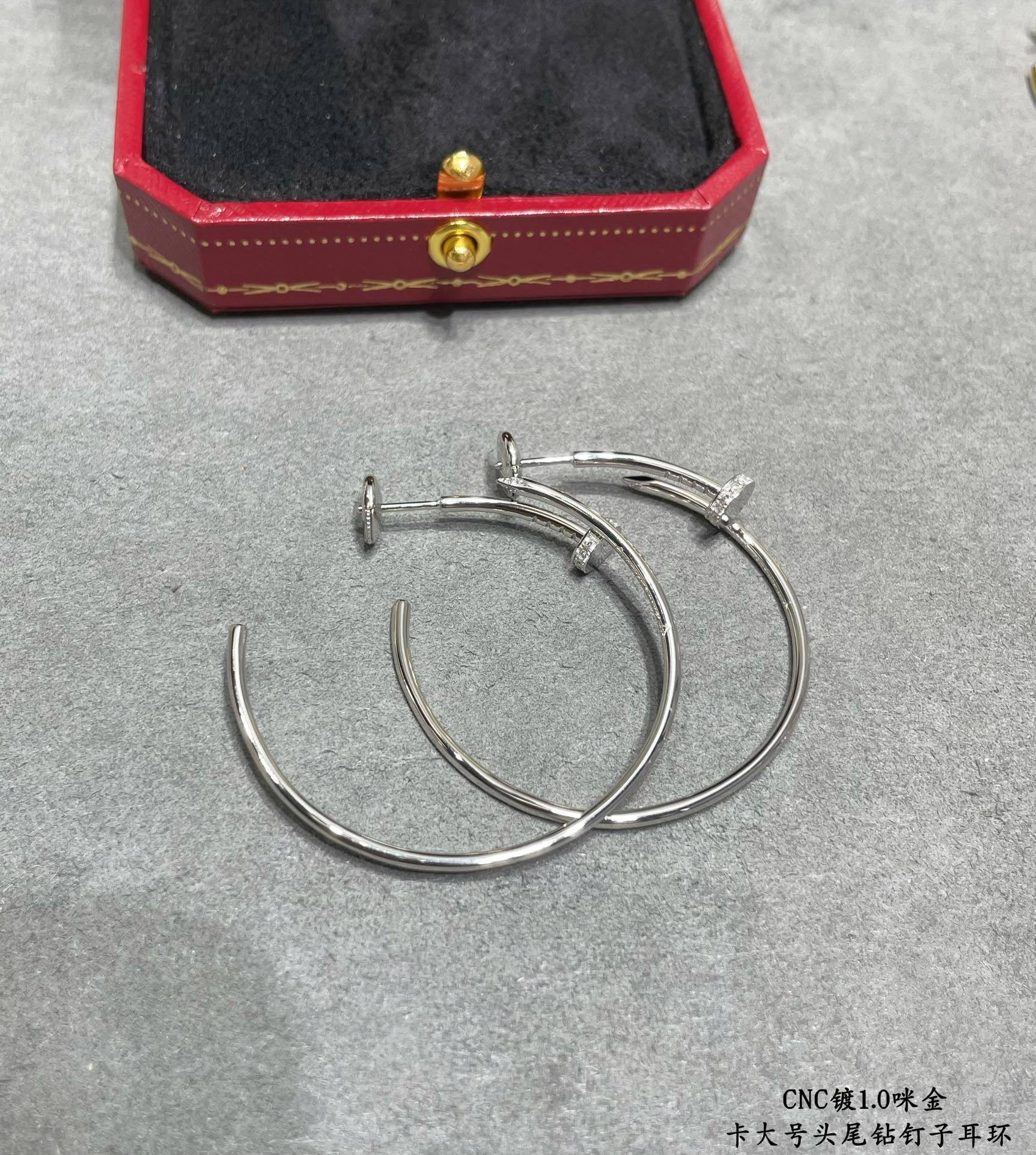 ca*t*er large size head and tail Di*m*nd nail earrings