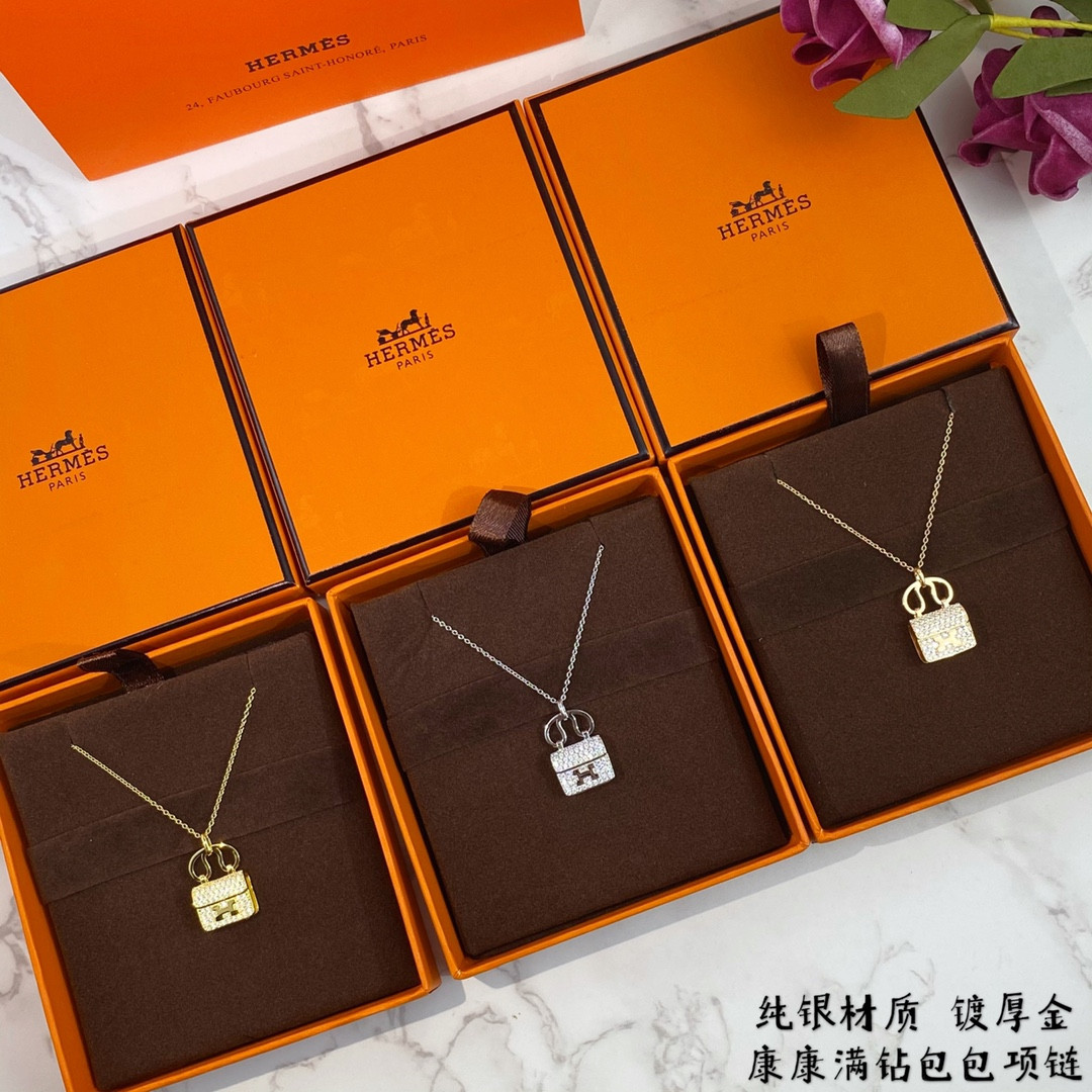 hermès fully Di*m*nd-encrusted h bag necklace