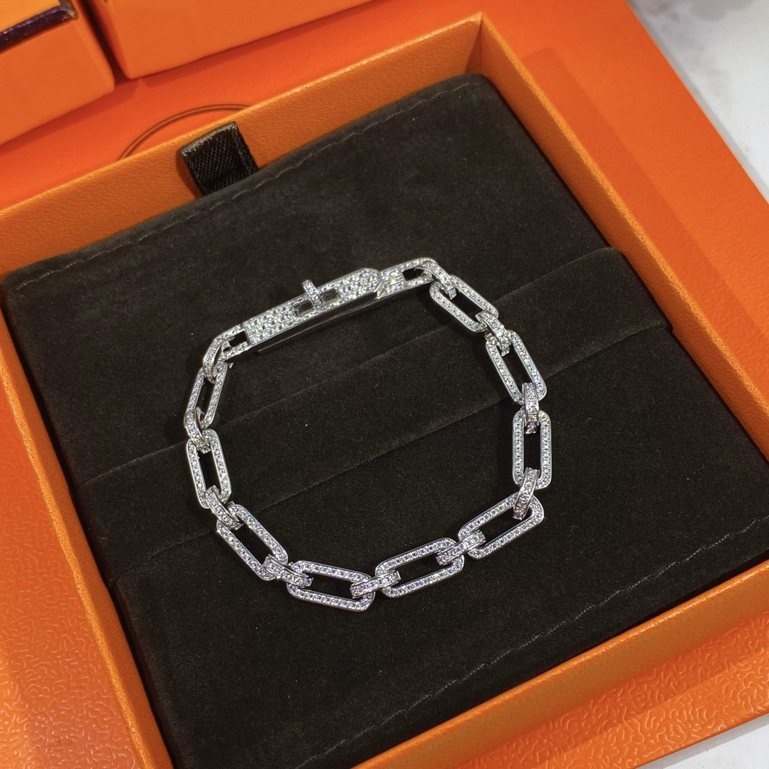 hermès fully Di*m*nd-encrusted kelly bracelet