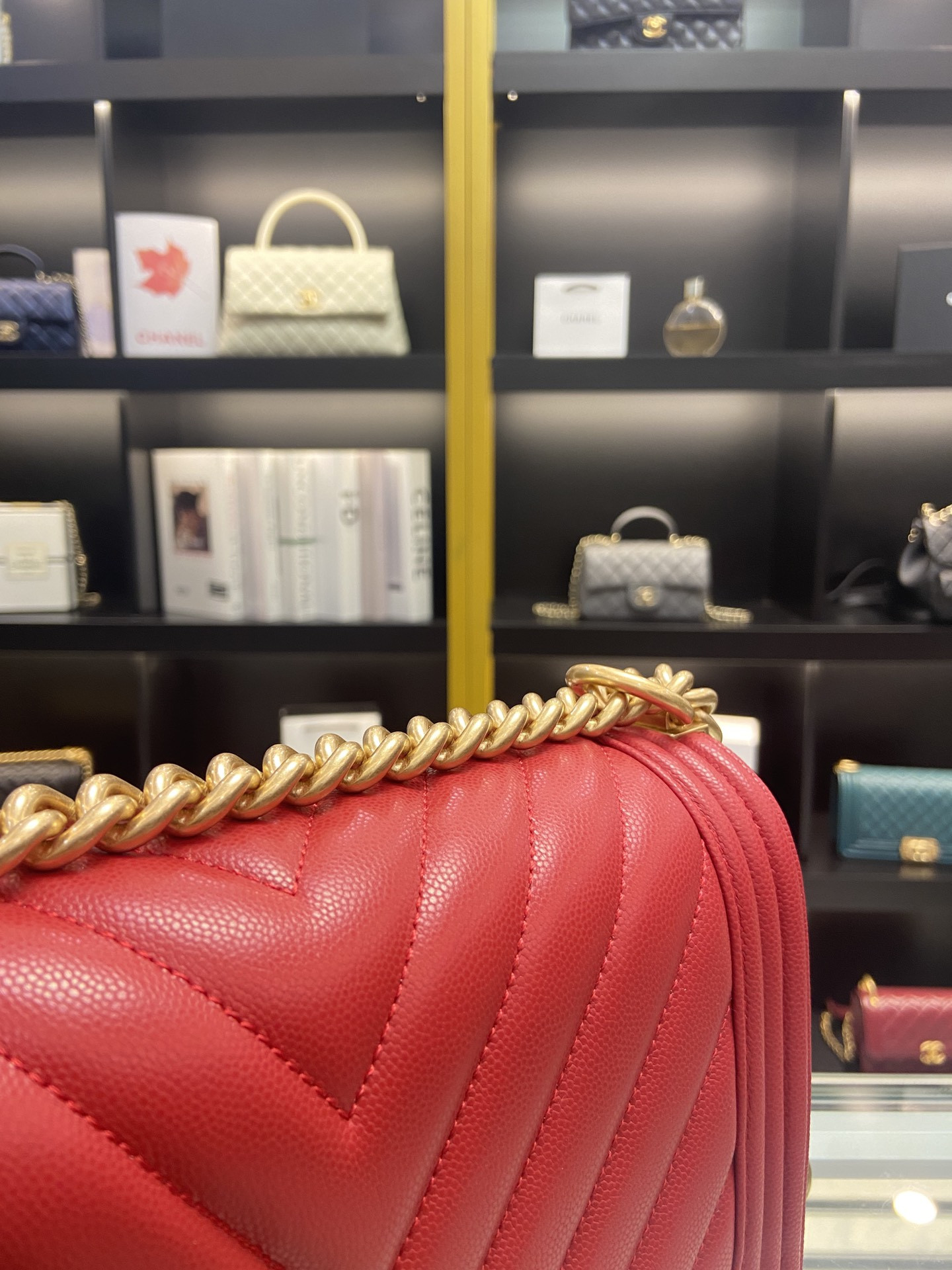 boy Ch*el handbag shiny red grained calfskin & gold-tone metal 5.9 × 9.8 × 3.5 in