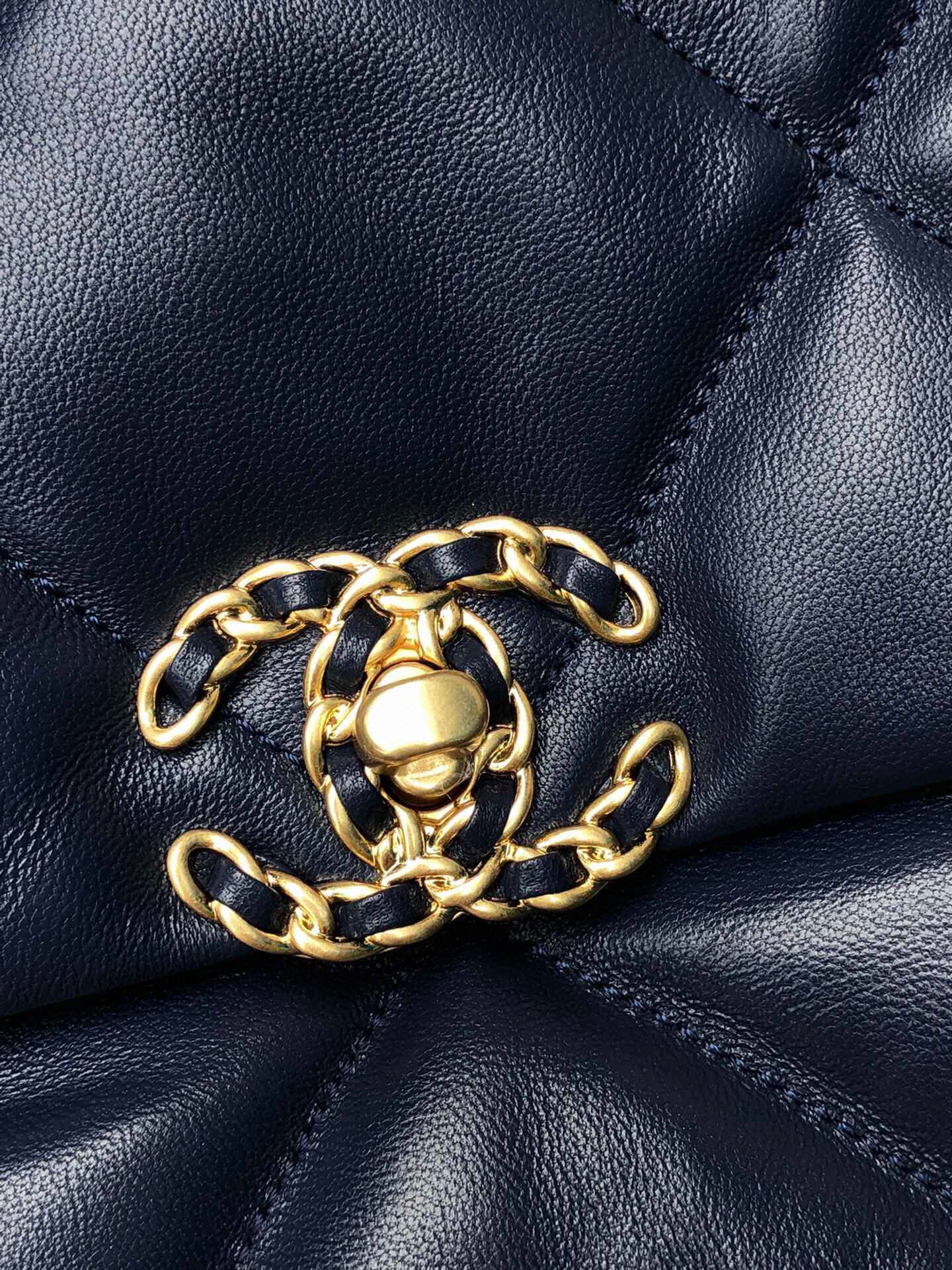 Ch*el 19 large handbag shiny leather, gold-tone, silver-tone & ruthenium-finish metal navy 7.8 × 11.7 × 3.9 in
