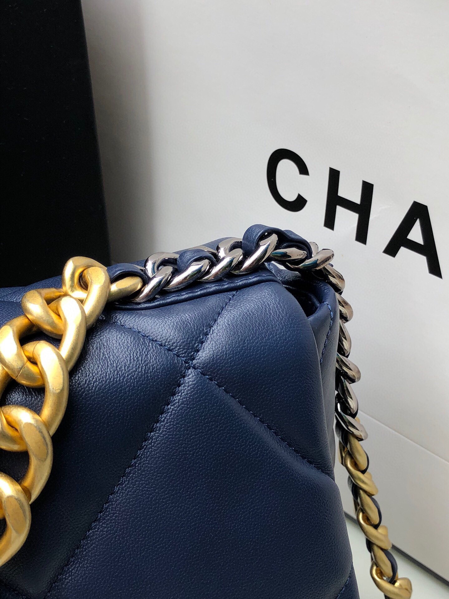 Ch*el 19 large handbag shiny leather, gold-tone, silver-tone & ruthenium-finish metal navy 7.8 × 11.7 × 3.9 in