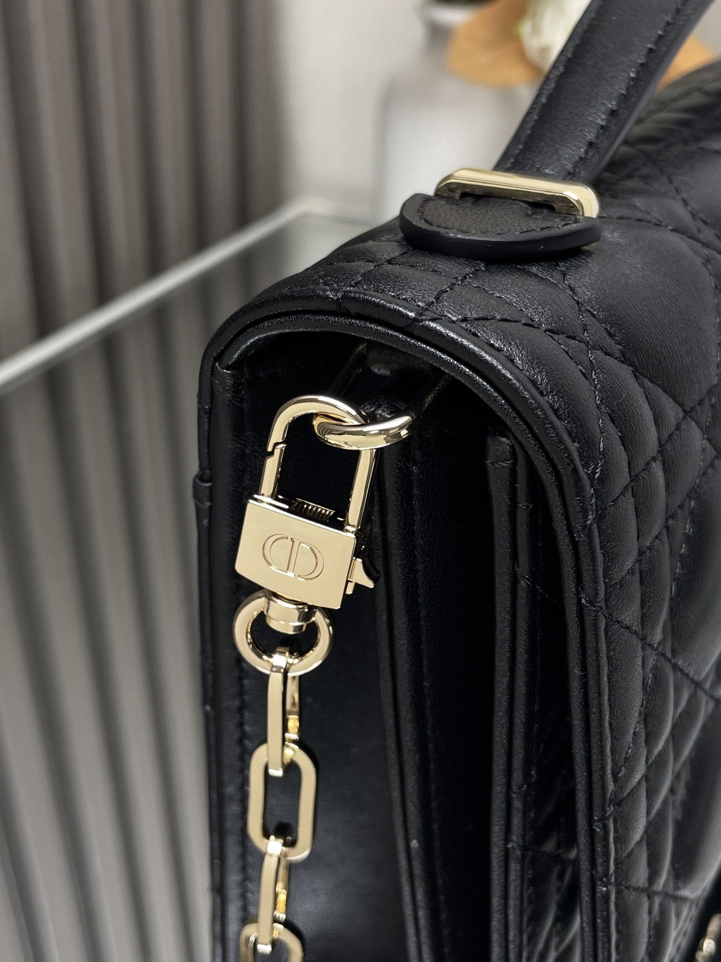 my D*or top handle bag black 9.5 x 5.5 x 3 inches