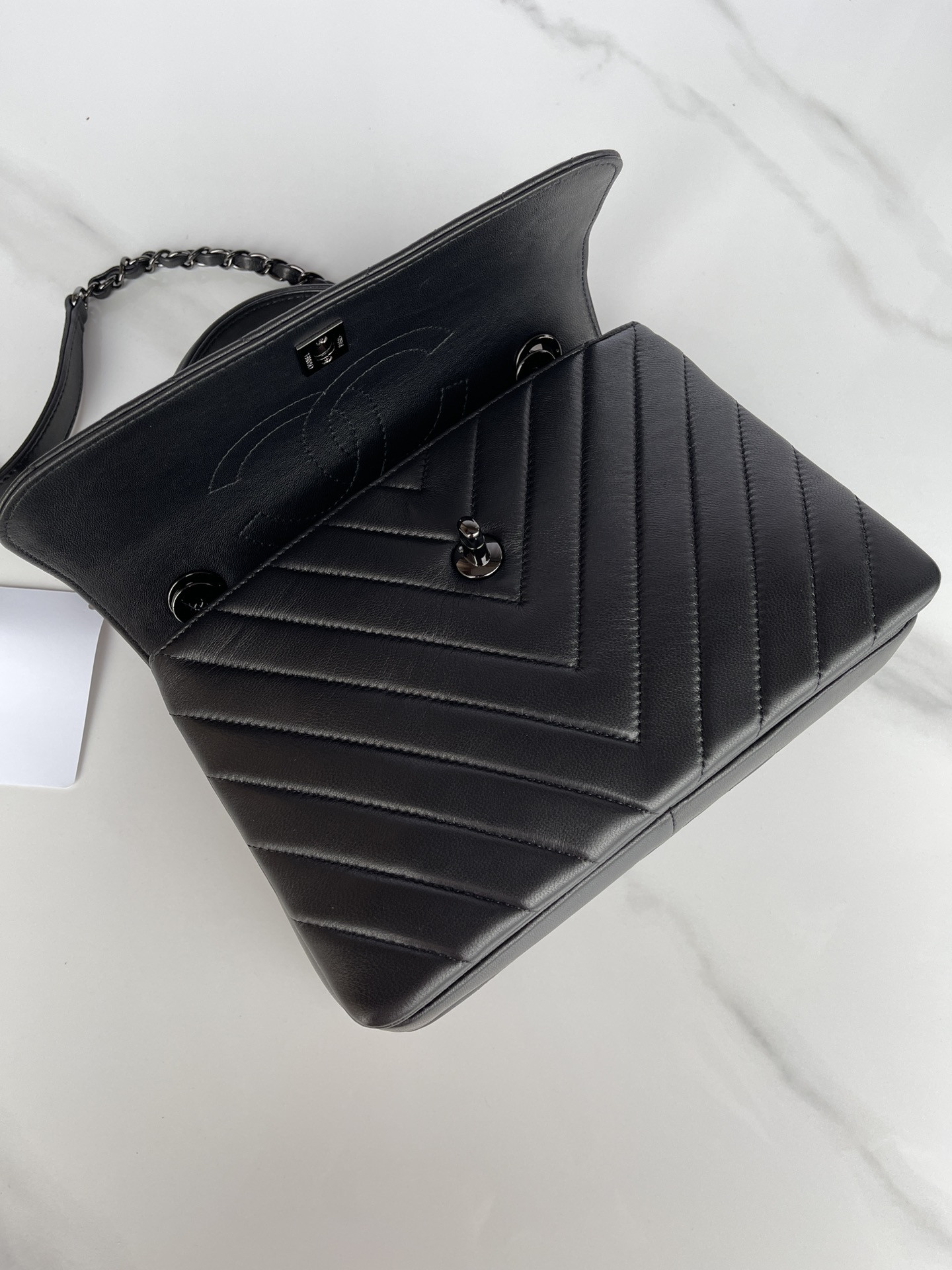 Ch*el flap bag with top handle 6.6 × 9.8 × 4.7 in