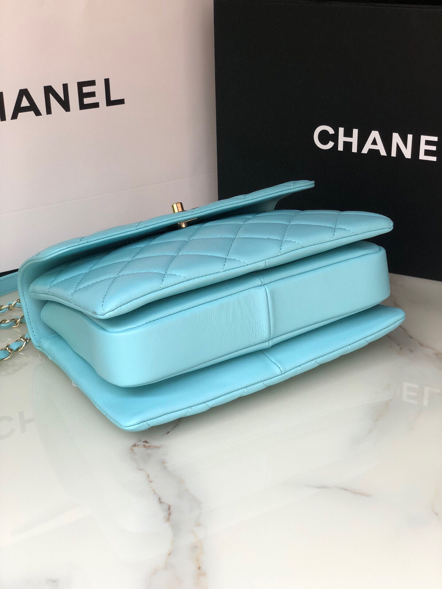 Ch*el flap bag with top handle 6.6 × 9.8 × 4.7 in