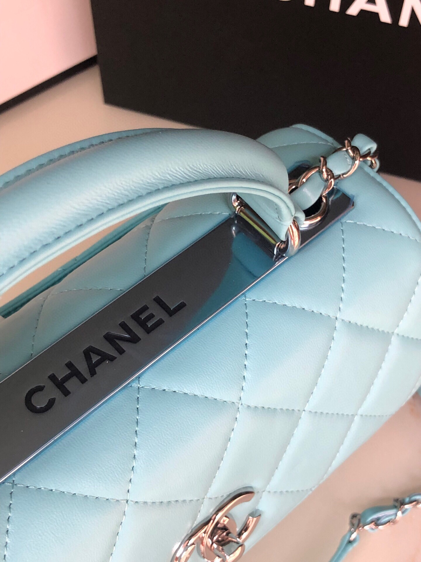 Ch*el flap bag with top handle 6.6 × 9.8 × 4.7 in