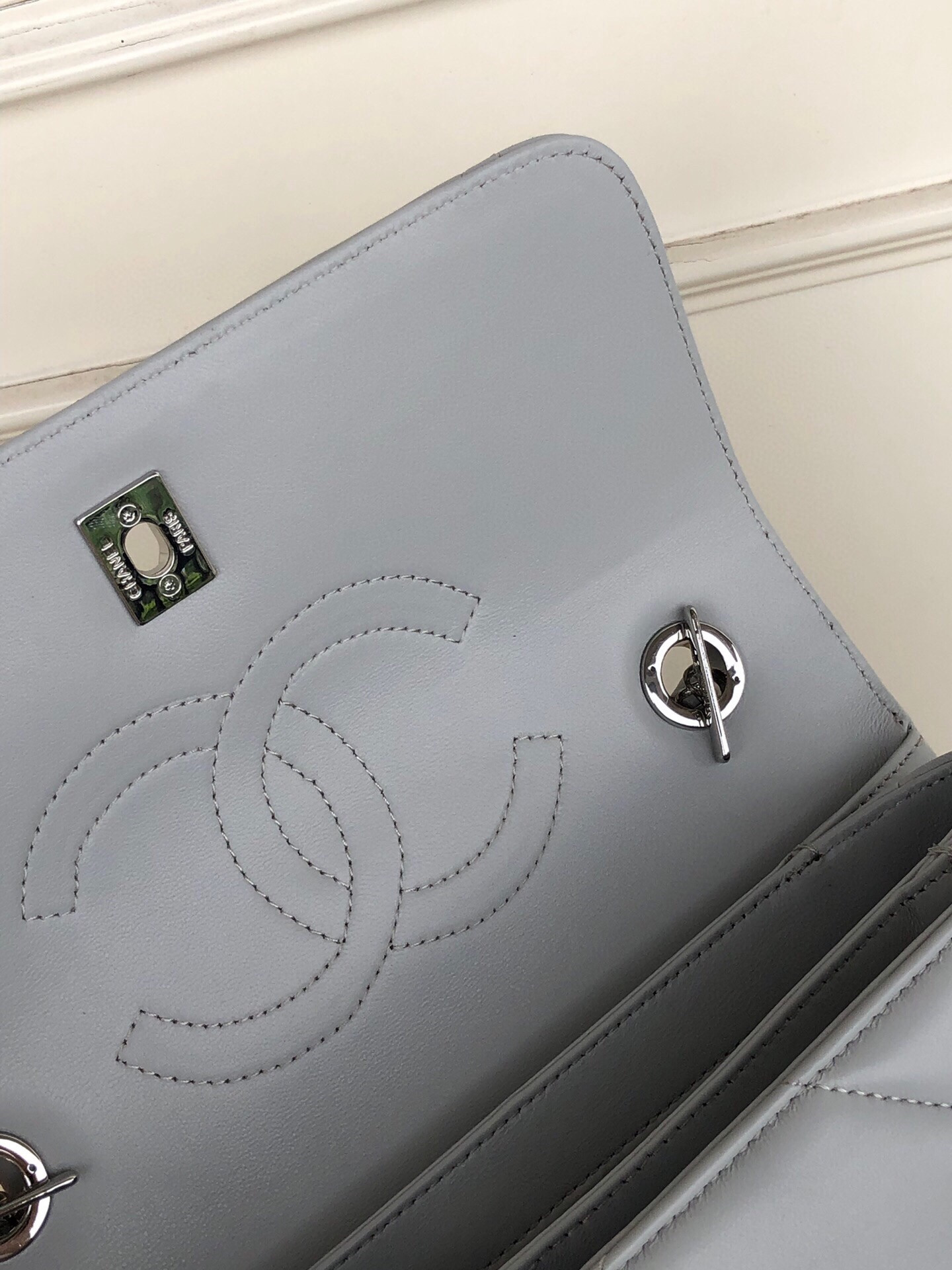 Ch*el flap bag with top handle 6.6 × 9.8 × 4.7 in