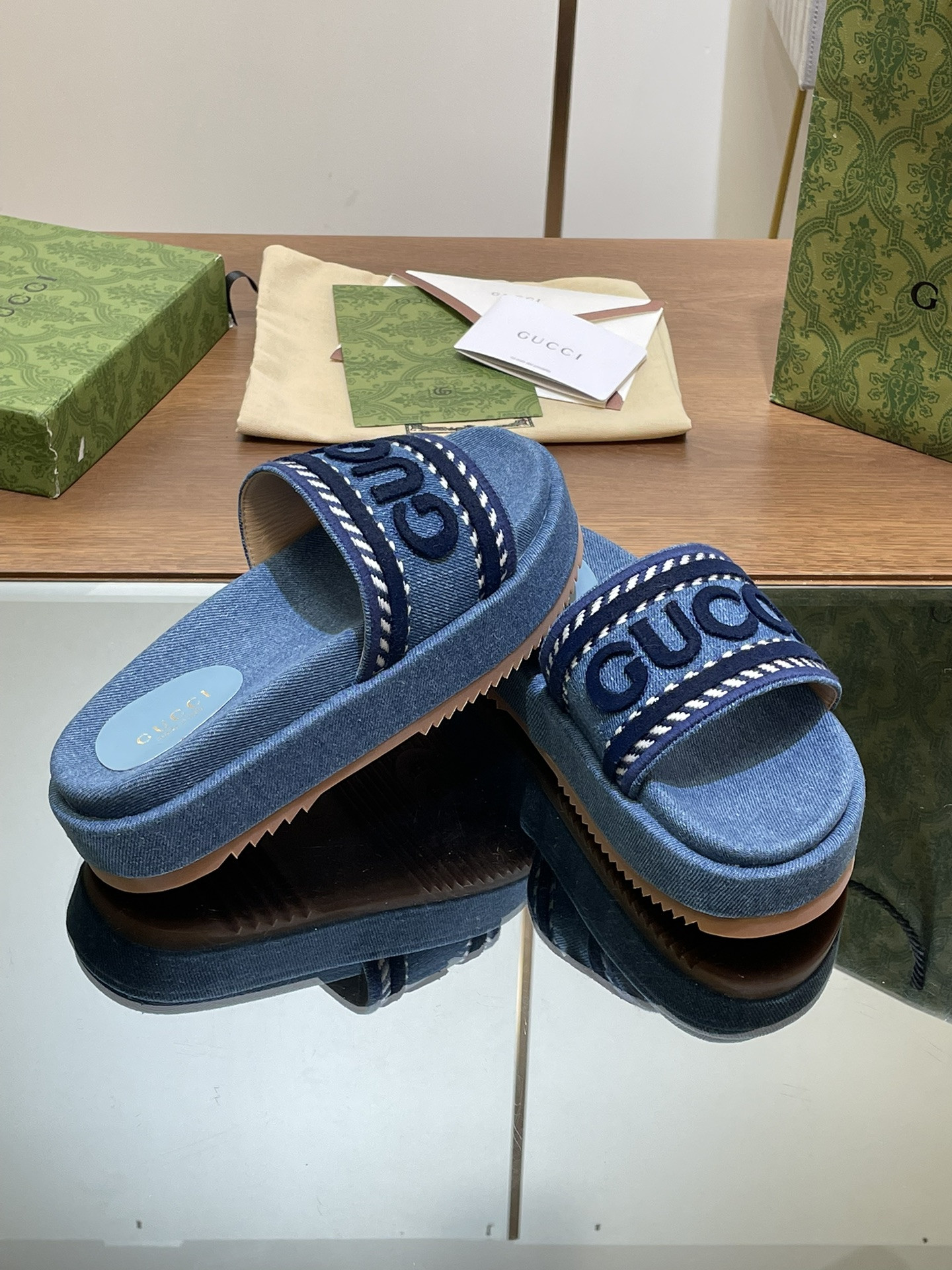 ua G*u*i slide sandal with G*u*i script