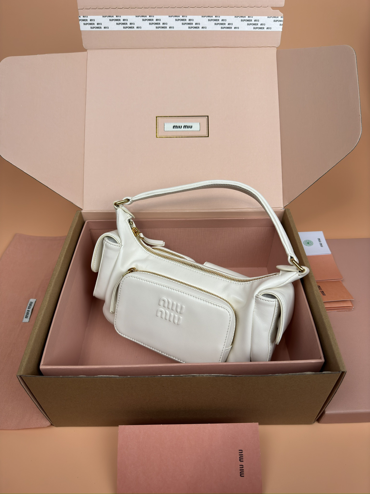 Miu Miu Hobo Nappa leather pocket bag  12x21x6cm